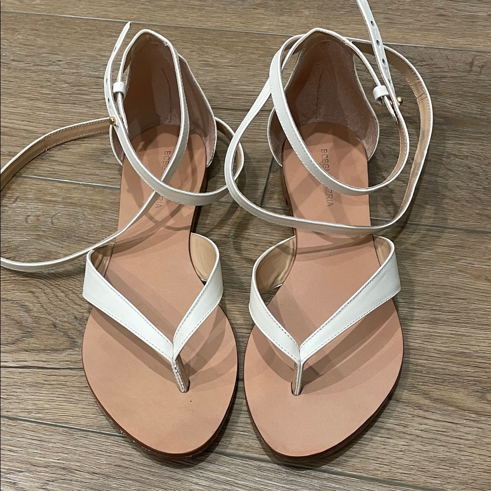 BCBG Maxazria Cream Strappy Sandals. Straps wrap around ankle. Size 8 1/2.